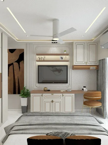 This view shows the TV unit and study desk integrated into the master bedroom. The design maintains the same color palette and classic molding details, ensuring the entire room feels harmonious.
