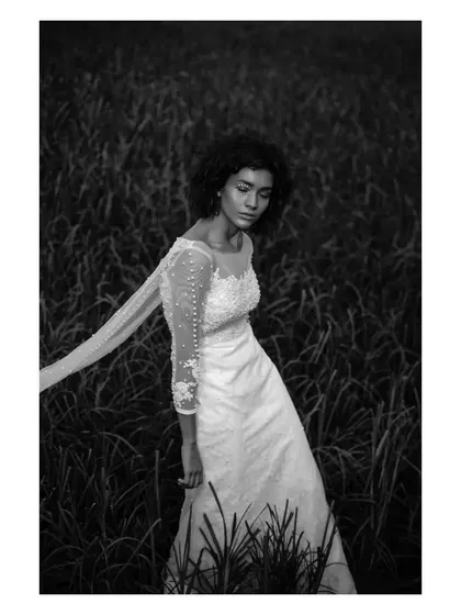 A hauntingly beautiful black and white bridal portrait. The flowing veil and the natural setting give this image a timeless, gothic romance feel.
