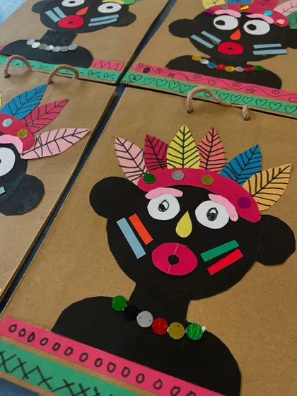 A detailed shot showing the layering of paper and the use of sequins to create texture and interest.