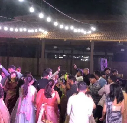 Another shot of the lively Konkani wedding reception.