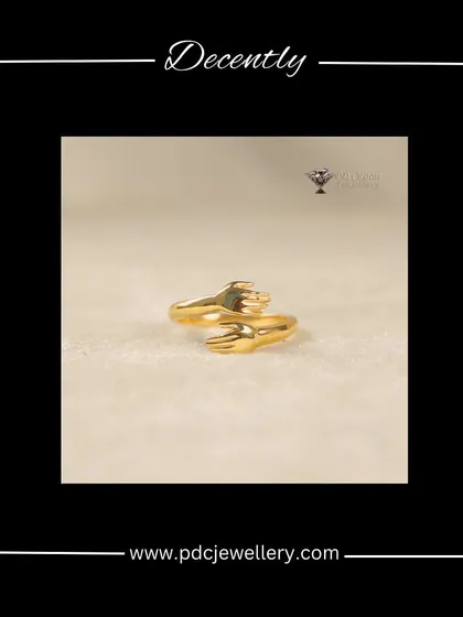 A decent and unique hug ring crafted in 22kt hallmarked gold. This minimalist design is a beautiful symbol of love and connection, perfect for everyday wear.