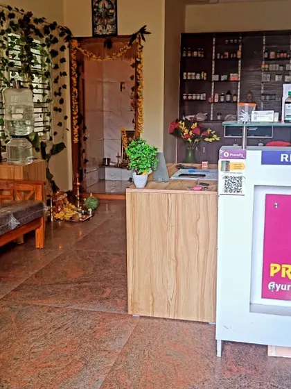 Another view of my clinic's reception area, where you can see our organized dispensary of Ayurvedic medicines in the background. I ensure a tranquil and orderly space for all my patients.