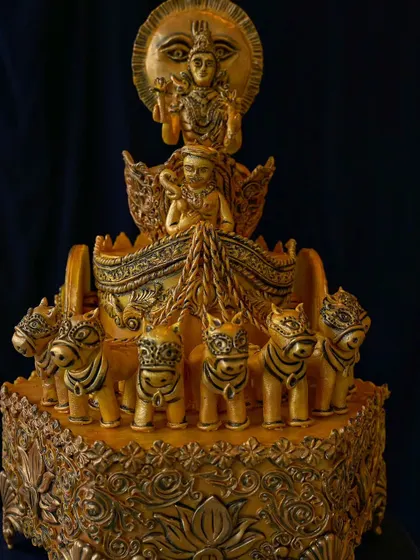 This is one of my most intricate and challenging creations, a fully edible golden chariot of the Sun God. This piece was a labor of love that pushed my creative skills and reminds me to always dream big.