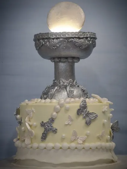 I felt challenged by this Holy Communion cake idea and I'm so glad it worked out. The spotlight inside the host makes the entire piece glow, creating a truly divine effect.