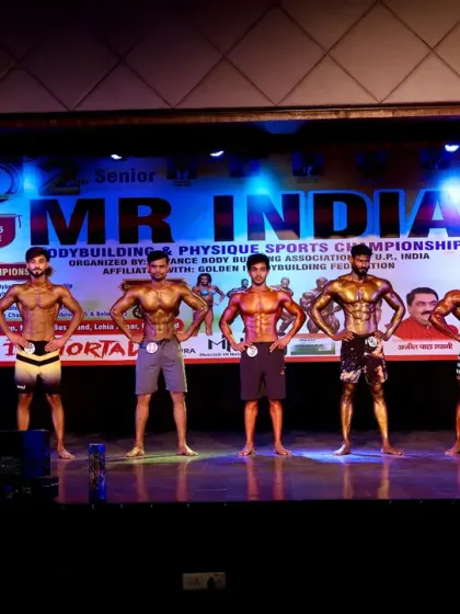 A full lineup of dedicated athletes at the Mr. India competition. We provide the coaching and support to help our members stand shoulder to shoulder with the best.