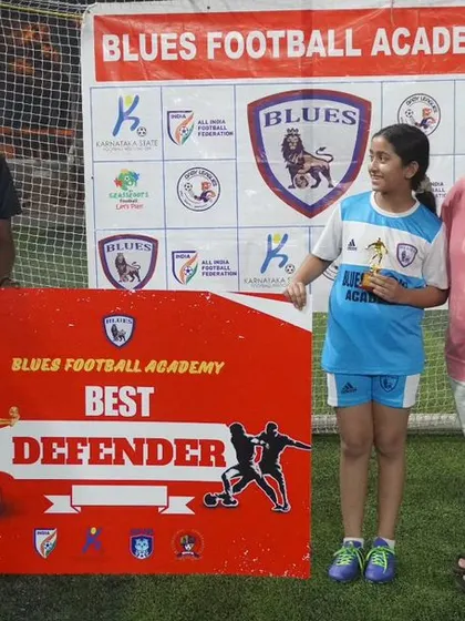 A second angle of the "Best Defender" award, celebrating the crucial role of defensive players in any successful team.
