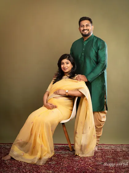 Celebrating your journey with the richness of tradition. This couple's portrait, with the mom-to-be in a radiant yellow saree and her partner in a coordinating kurta, showcases the vibrant and elegant style of my traditional maternity shoots.