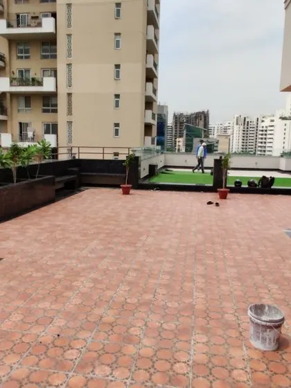 The terrace of a 600 sq. yard project in DLF Gurgaon, during execution. We designed this space to be a functional outdoor lounge area with ample seating and planters.
