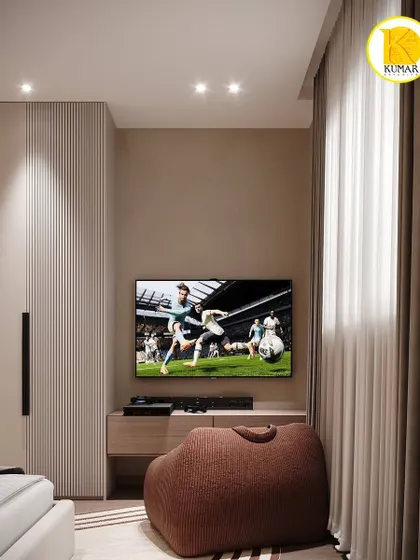 The TV and storage unit in the same compact bedroom, showing how every inch of space is utilized effectively.