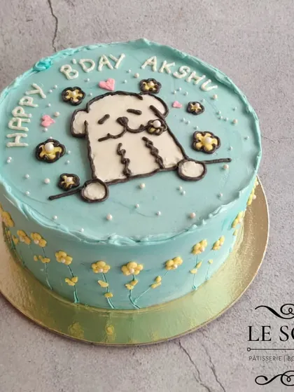This cake was based on a sketch my client drew. I brought their vision to life on this 1 kg Intense Dark Chocolate Truffle cake, featuring a cute dog design in a lovely shade of blue.