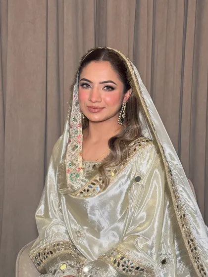Maanvi, looking absolutely angelic for her Roka ceremony. The makeup is soft, dewy, and enhances her natural glow.