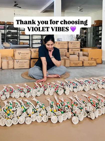 Thank you for choosing Violet Vibes. This image shows us surrounded by our 'Symphony Chimes', a product that has brought us so much joy to create. We are so grateful for your support.
