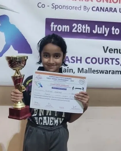 Our upcoming little champion, Yuktha Harsha, proudly holding her gold medal trophy for winning the U-11 girls category.