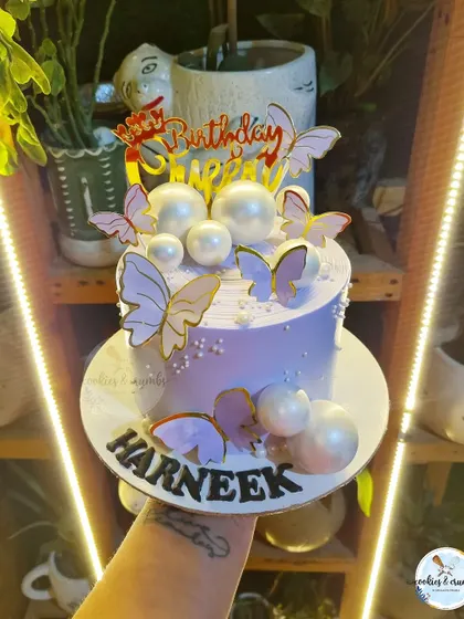 My butterfly and ombre cakes are a customer favorite. The gradient of colors, delicate butterflies, and pearl details create a dreamy and elegant look for any occasion.