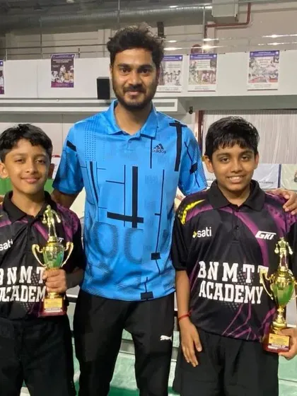 Our U-13 champions, Shriram and Sudhanva, celebrating their victories with a senior player at the Mangalore state ranking tournament.