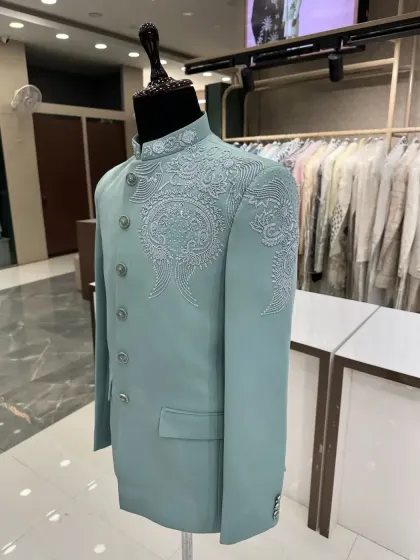 Another angle of the mint green Jodhpuri, showing its flawless cut and structure.