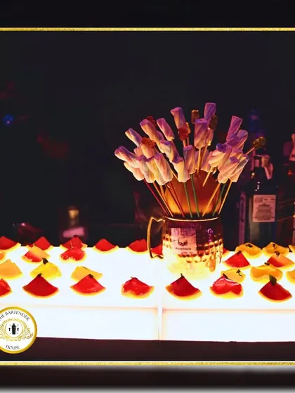 A playful and sweet garnish idea. Here, we've arranged marshmallow sticks and fruit jellies on the bar, ready to add a touch of fun to any drink.