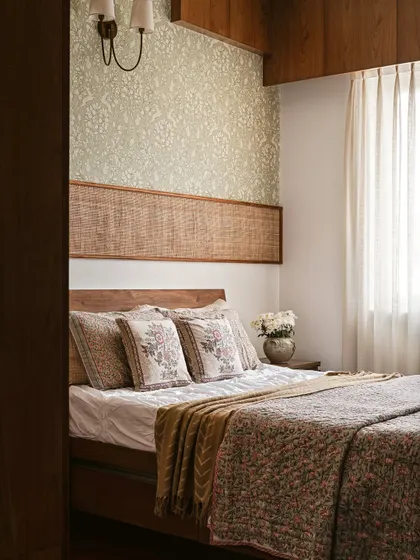 A duplicate of image 18, highlighting the cozy textures and materials in the guest bedroom.