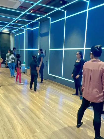 Photos from a contemporary and jazz workshop, showing a diverse group of students learning together. My classes are a great way to meet people and be part of a community.