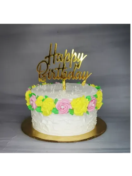A rustic floral cake with butterscotch flavor. This cake features a simple design with yellow and pink piped flowers.
