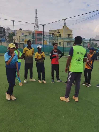 A group of young players listening intently to their coach. Our facilities provide a safe and professional environment for cricketers of all ages to learn and grow.