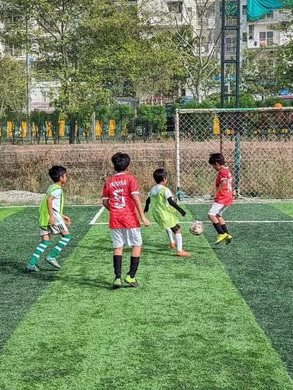 Intense action from a friendly match between our U10 team and Goal Hunters U10. These games are crucial for development and applying skills learned in training.