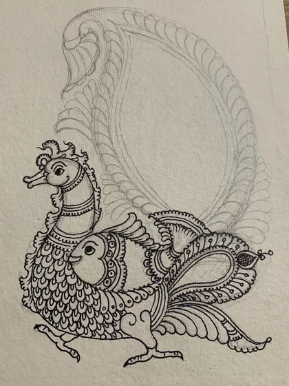 The first phase of a Kalamkari artwork: the initial ink drawing. This stage is crucial for establishing the composition and intricate details before any color is applied.