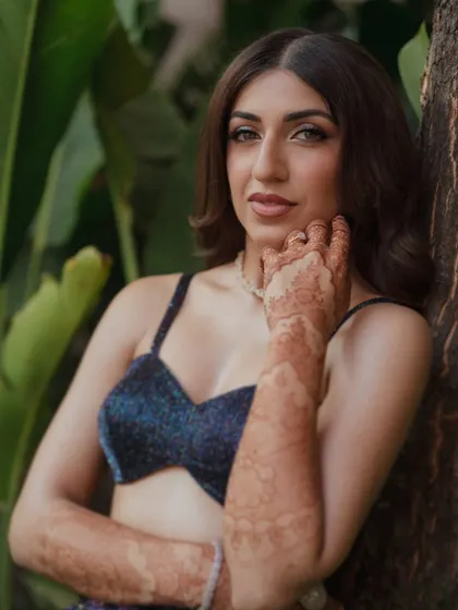 Sheena's Sangeet glam was all about glowing skin and sparkling eyes. We gave her a soft sculpt to define her features and an eye look that matched the shimmer of her outfit.