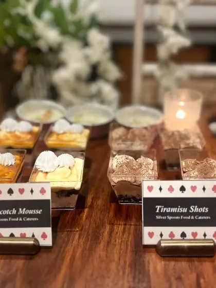 A dessert platter featuring two of our most popular items: creamy Butterscotch Mousse and rich Tiramisu Shots. This combination offers something for every sweet tooth at your Diwali party.