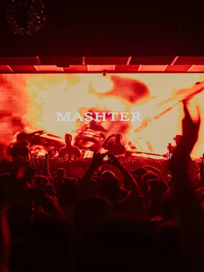 A close-up of the visuals, which were a key part of the show's impact. The abstract, fiery imagery perfectly complemented the driving techno beats.