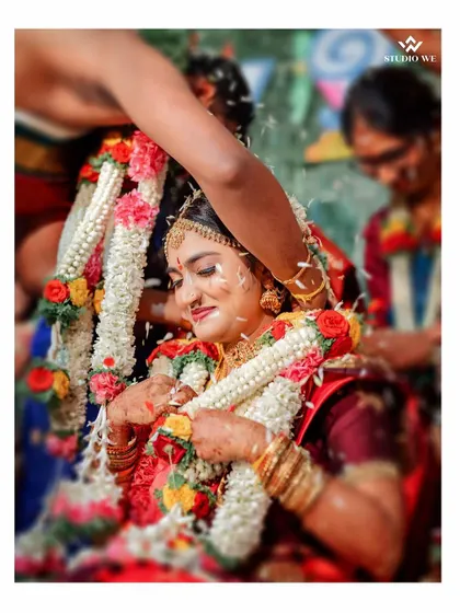 A beautiful, soft-focus shot of the bride during her wedding ceremony, capturing her serene expression.