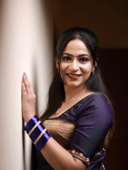 A gorgeous guest look for an evening event. The makeup features a subtle smokey eye and a warm smile.