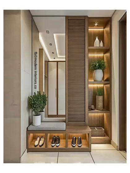 Another look at this clean and organized entryway. The design includes a cushioned bench with open shoe storage below, a full-length mirror, and lit display shelves.