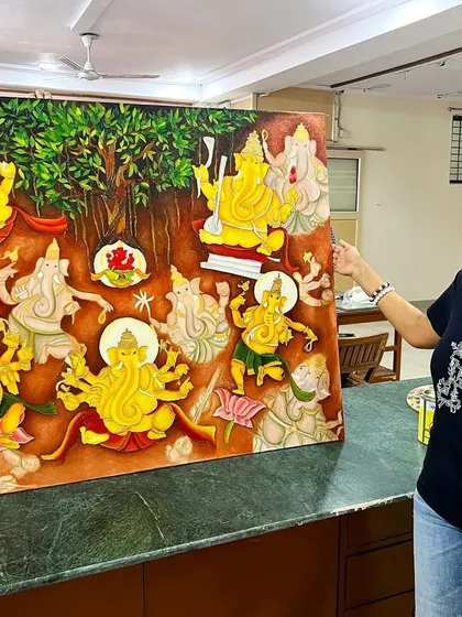 Another angle of Pooja with her magnificent Ganesha oil painting. We support our students through long-term projects, helping them bring their ambitious ideas to life.