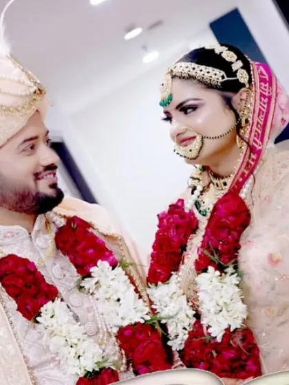 A lovely portrait of the newlyweds, gazing at each other after the Varmala ceremony.