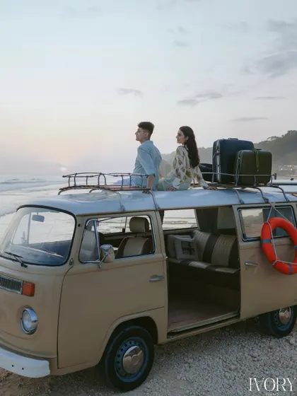 A beautiful sunset, a vintage van, and the open road ahead. We designed this adventurous pre-wedding shoot in Bali to capture the couple's free-spirited journey into their new life together, with the ocean as their witness.