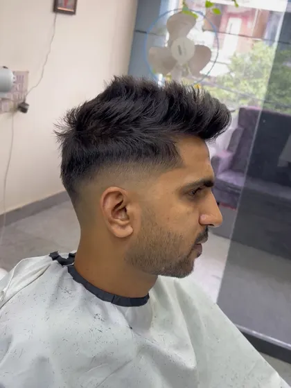 A textured top with a mid-fade.