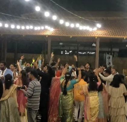 A view from the DJ console of a packed dance floor. The synergy between a good emcee and DJ is key to a great party.