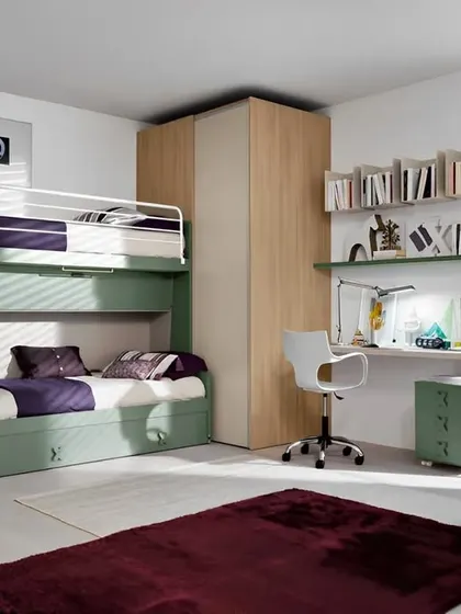 This space-saving bunk bed design is perfect for a compact room. The soft green color and integrated desk create a functional zone for both sleep and study, proving you don't need a large room to have a great setup.