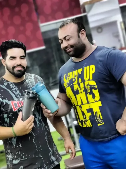 Cheers with a protein shake after a hard workout with my brother.