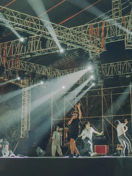 A behind-the-scenes look at our sound check, with dancers running through formations under the full stage lighting rig. Preparation is key to a flawless show.