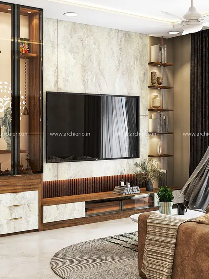This living room features a custom TV unit with an integrated pooja mandir. The design uses a beautiful marble-finish back panel and open shelving for a balanced look.