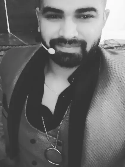 Another behind-the-scenes moment, ready to go on stage. This black and white shot captures the focus before the performance begins.