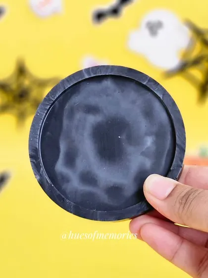 A mini coaster with a smoky black and grey marble effect. It's a more subtle nod to the Halloween theme, perfect for a minimalist spooky aesthetic.