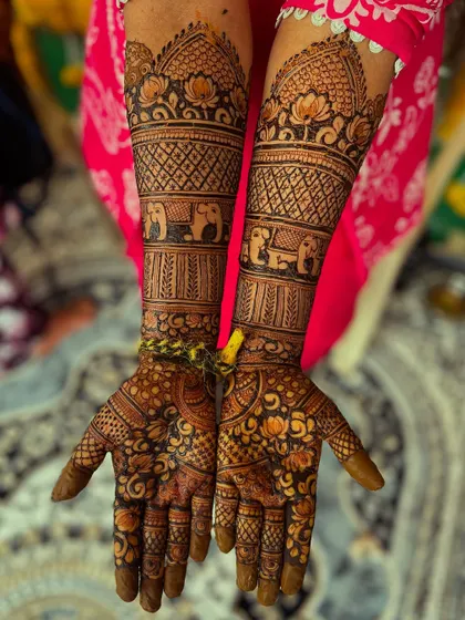 A full view of the traditional Hindu bridal henna, showcasing the beautiful symmetry and cultural motifs.