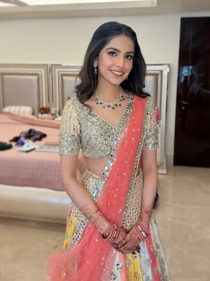 Another angle of Manvi's pink perfection Roka look. The soft makeup lets her beautiful Abhinav Mishra lehenga and her happy smile be the focus.