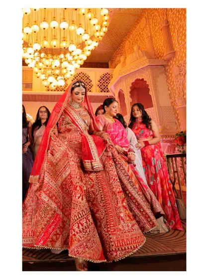 The bride's grand entrance. Her makeup is designed to be captivating, ensuring all eyes are on her as she walks down the aisle.