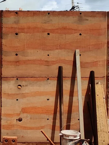 Another view of the rammed earth wall, showing its glorious texture and color variations.