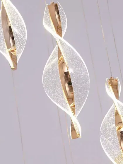 A close-up of the textured acrylic on our spiral pendants. The details create a glittering effect when the light is on.