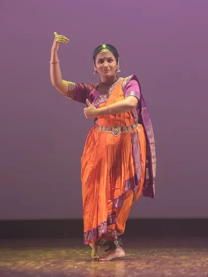 A confident stance during a Bharatanatyam performance. Our training builds not just skill but also the stage presence needed to command an audience.